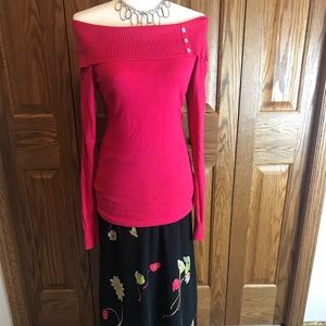 Candie’s long pink off the shoulder sweater